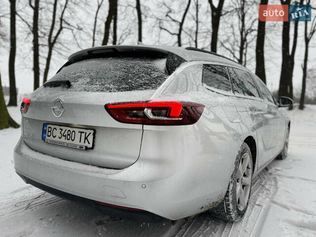 Серый Опель Инсигния, объемом двигателя 1.6 л и пробегом 233 тыс. км за 13999 $, фото 4 на Automoto.ua