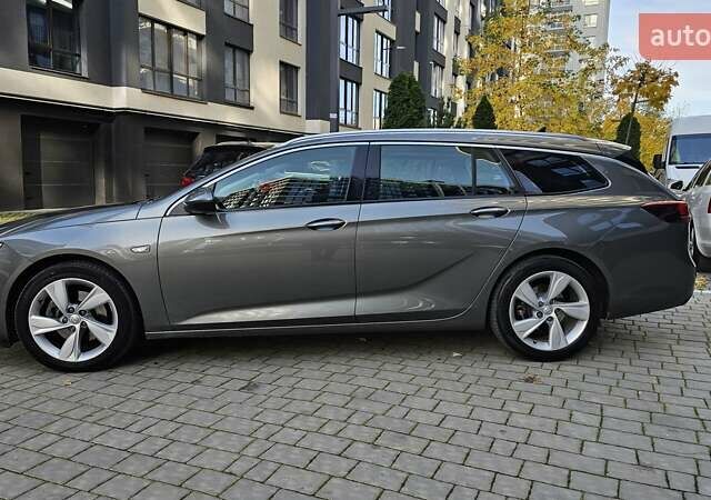 Сірий Опель Інсігнія, об'ємом двигуна 1.6 л та пробігом 169 тис. км за 12800 $, фото 2 на Automoto.ua