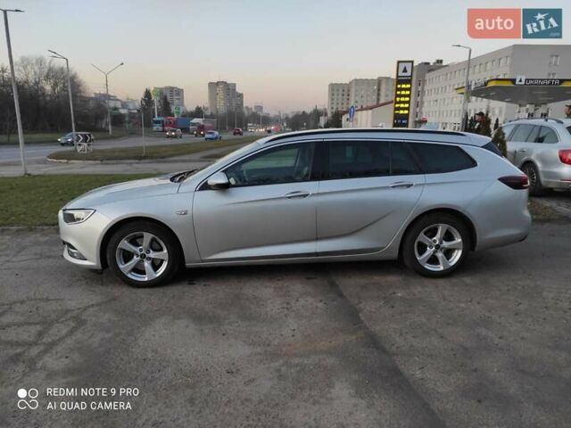 Сірий Опель Інсігнія, об'ємом двигуна 1.6 л та пробігом 230 тис. км за 15499 $, фото 2 на Automoto.ua