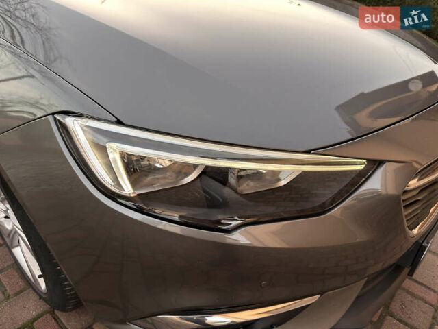 Серый Опель Инсигния, объемом двигателя 1.6 л и пробегом 169 тыс. км за 13900 $, фото 64 на Automoto.ua