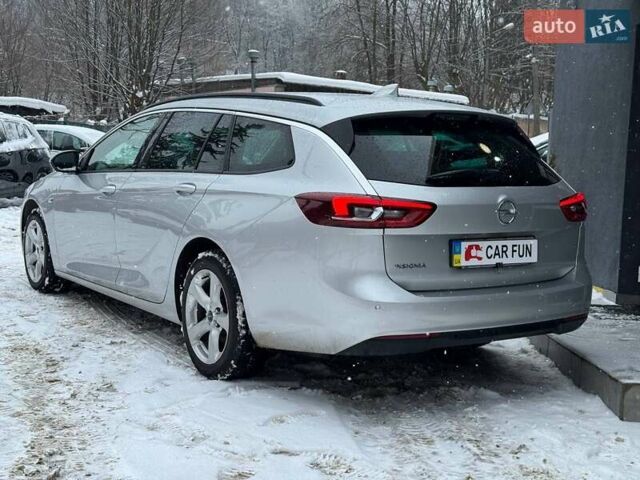 Серый Опель Инсигния, объемом двигателя 1.6 л и пробегом 250 тыс. км за 12700 $, фото 5 на Automoto.ua