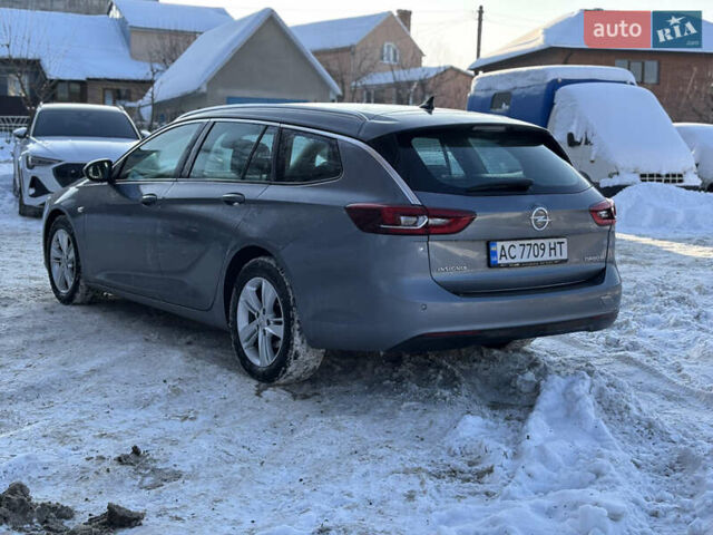 Серый Опель Инсигния, объемом двигателя 1.6 л и пробегом 177 тыс. км за 14000 $, фото 4 на Automoto.ua