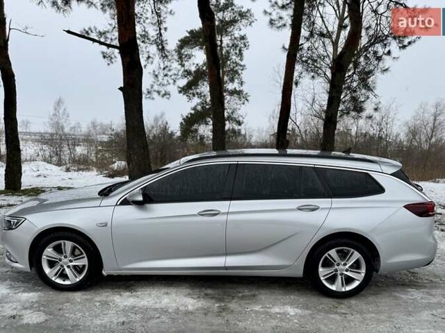 Сірий Опель Інсігнія, об'ємом двигуна 2 л та пробігом 207 тис. км за 12300 $, фото 6 на Automoto.ua