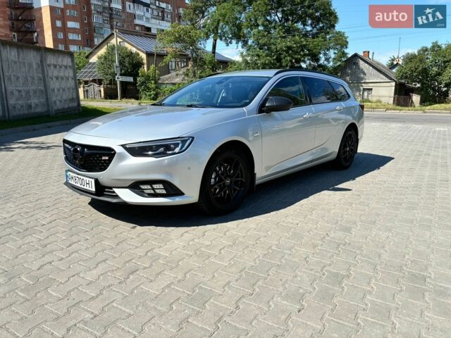 Сірий Опель Інсігнія, об'ємом двигуна 1.96 л та пробігом 235 тис. км за 14890 $, фото 4 на Automoto.ua