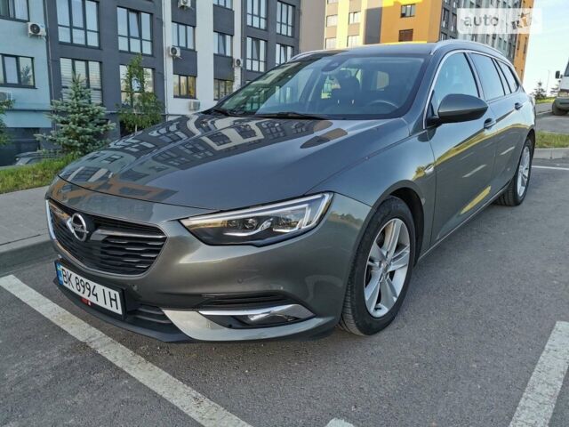 Серый Опель Инсигния, объемом двигателя 2 л и пробегом 220 тыс. км за 15500 $, фото 1 на Automoto.ua