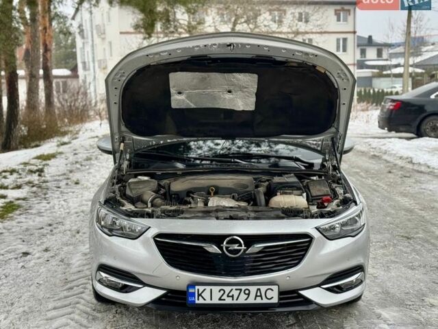 Серый Опель Инсигния, объемом двигателя 2 л и пробегом 207 тыс. км за 13800 $, фото 7 на Automoto.ua