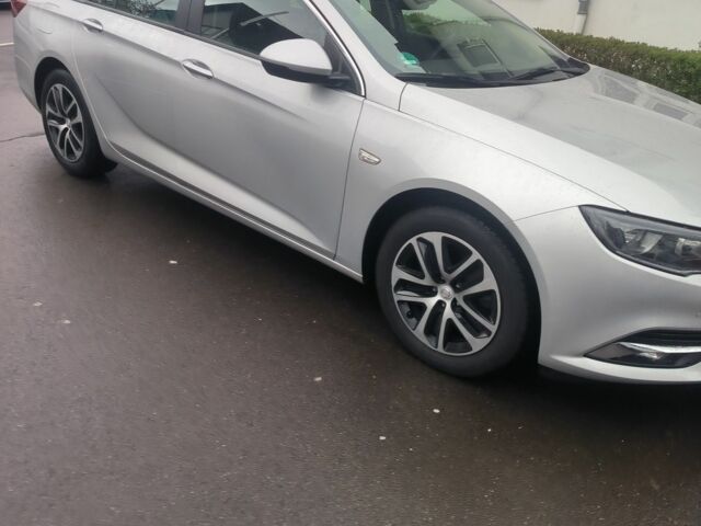 Сірий Опель Інсігнія, об'ємом двигуна 2 л та пробігом 84 тис. км за 371 $, фото 2 на Automoto.ua