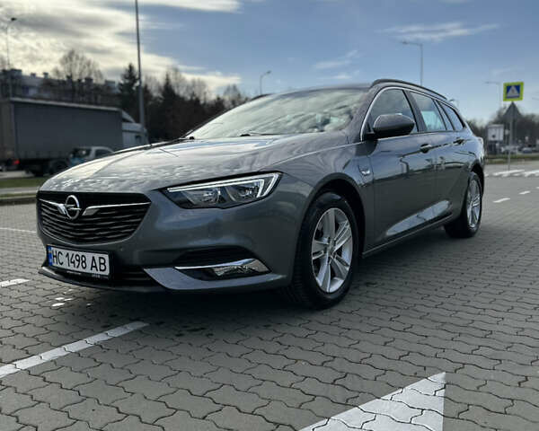 Сірий Опель Інсігнія, об'ємом двигуна 1.96 л та пробігом 160 тис. км за 14900 $, фото 4 на Automoto.ua