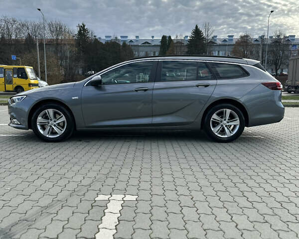 Сірий Опель Інсігнія, об'ємом двигуна 1.96 л та пробігом 160 тис. км за 14900 $, фото 6 на Automoto.ua