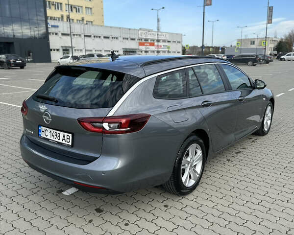 Сірий Опель Інсігнія, об'ємом двигуна 1.96 л та пробігом 160 тис. км за 14900 $, фото 11 на Automoto.ua