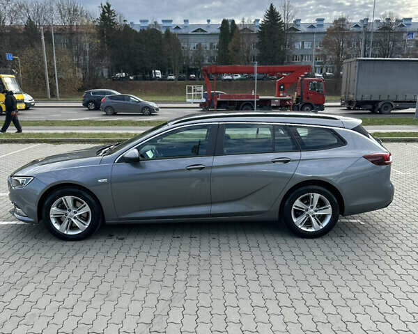 Сірий Опель Інсігнія, об'ємом двигуна 1.96 л та пробігом 160 тис. км за 14900 $, фото 5 на Automoto.ua