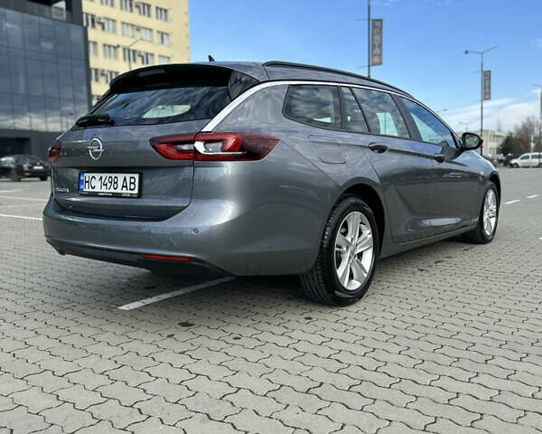 Сірий Опель Інсігнія, об'ємом двигуна 1.96 л та пробігом 160 тис. км за 14900 $, фото 12 на Automoto.ua