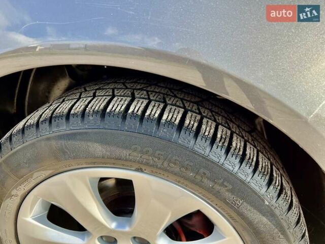 Серый Опель Инсигния, объемом двигателя 1.8 л и пробегом 208 тыс. км за 7400 $, фото 9 на Automoto.ua