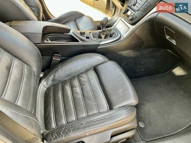 Серый Опель Инсигния, объемом двигателя 1.8 л и пробегом 208 тыс. км за 7400 $, фото 14 на Automoto.ua