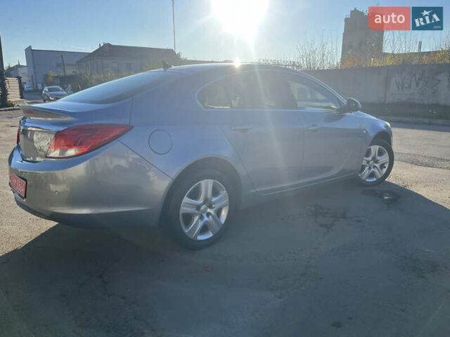 Серый Опель Инсигния, объемом двигателя 1.8 л и пробегом 188 тыс. км за 7200 $, фото 2 на Automoto.ua