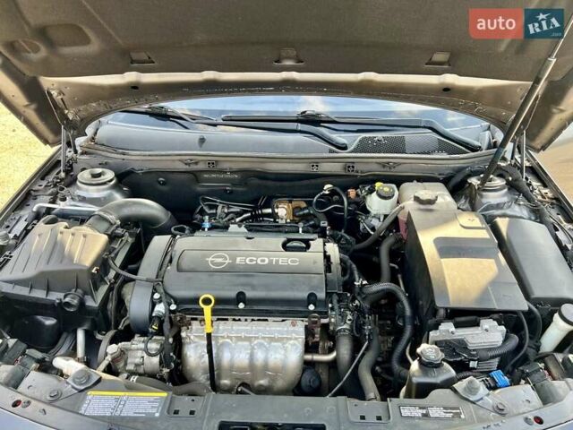 Серый Опель Инсигния, объемом двигателя 1.8 л и пробегом 208 тыс. км за 7400 $, фото 16 на Automoto.ua