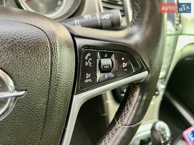 Серый Опель Инсигния, объемом двигателя 1.8 л и пробегом 208 тыс. км за 7400 $, фото 22 на Automoto.ua