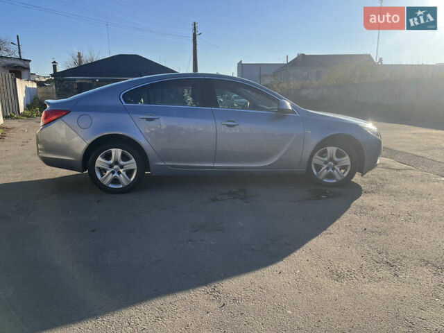 Серый Опель Инсигния, объемом двигателя 1.8 л и пробегом 188 тыс. км за 7200 $, фото 1 на Automoto.ua