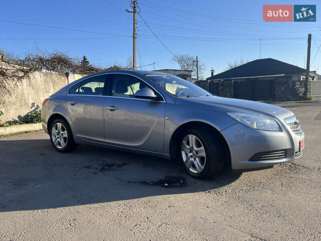 Серый Опель Инсигния, объемом двигателя 1.8 л и пробегом 188 тыс. км за 7200 $, фото 6 на Automoto.ua