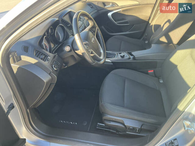 Серый Опель Инсигния, объемом двигателя 1.8 л и пробегом 188 тыс. км за 7200 $, фото 14 на Automoto.ua