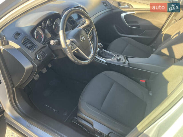 Серый Опель Инсигния, объемом двигателя 1.8 л и пробегом 188 тыс. км за 7200 $, фото 12 на Automoto.ua