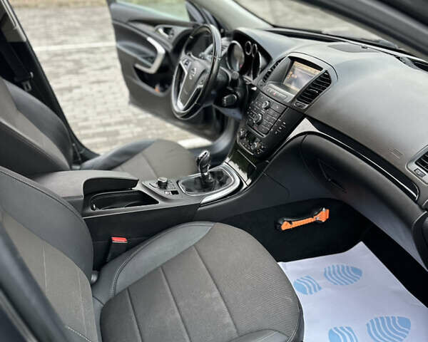 Серый Опель Инсигния, объемом двигателя 1.8 л и пробегом 234 тыс. км за 7500 $, фото 25 на Automoto.ua