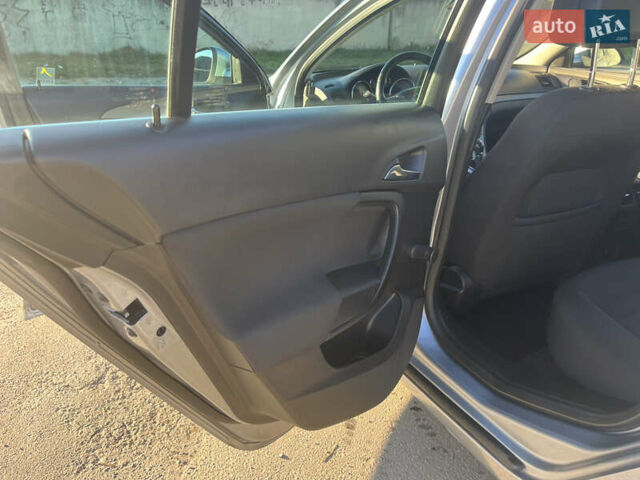 Серый Опель Инсигния, объемом двигателя 1.8 л и пробегом 188 тыс. км за 7200 $, фото 18 на Automoto.ua