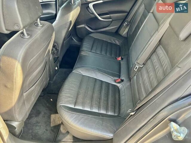 Серый Опель Инсигния, объемом двигателя 1.8 л и пробегом 208 тыс. км за 7400 $, фото 12 на Automoto.ua