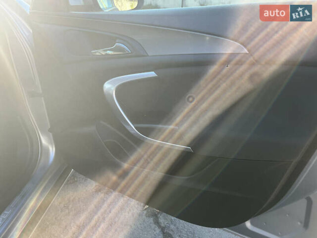 Серый Опель Инсигния, объемом двигателя 1.8 л и пробегом 188 тыс. км за 7200 $, фото 24 на Automoto.ua