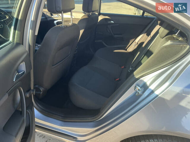 Серый Опель Инсигния, объемом двигателя 1.8 л и пробегом 188 тыс. км за 7200 $, фото 17 на Automoto.ua