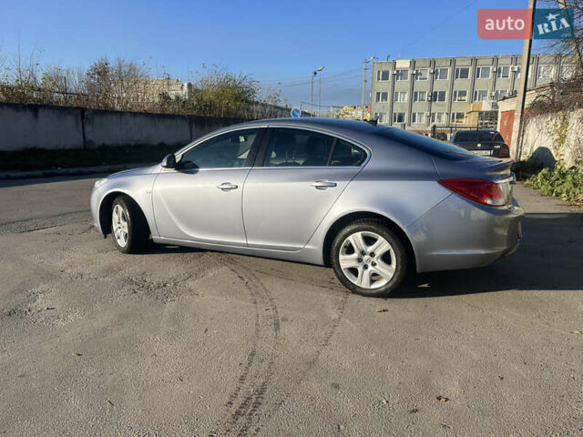 Серый Опель Инсигния, объемом двигателя 1.8 л и пробегом 188 тыс. км за 7200 $, фото 4 на Automoto.ua