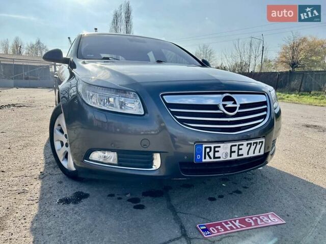 Серый Опель Инсигния, объемом двигателя 1.8 л и пробегом 208 тыс. км за 7400 $, фото 5 на Automoto.ua