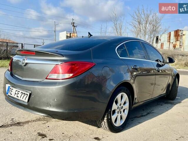 Серый Опель Инсигния, объемом двигателя 1.8 л и пробегом 208 тыс. км за 7400 $, фото 2 на Automoto.ua