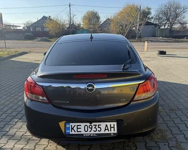 Серый Опель Инсигния, объемом двигателя 2 л и пробегом 263 тыс. км за 7300 $, фото 3 на Automoto.ua