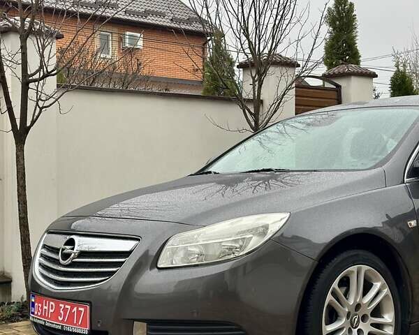 Серый Опель Инсигния, объемом двигателя 1.6 л и пробегом 122 тыс. км за 7999 $, фото 6 на Automoto.ua