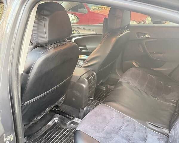 Серый Опель Инсигния, объемом двигателя 2 л и пробегом 263 тыс. км за 7300 $, фото 9 на Automoto.ua