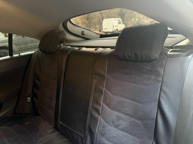 Серый Опель Инсигния, объемом двигателя 2 л и пробегом 263 тыс. км за 7300 $, фото 13 на Automoto.ua