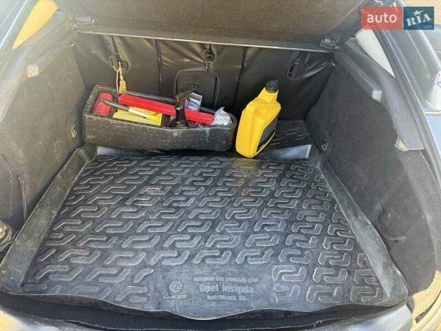 Серый Опель Инсигния, объемом двигателя 2 л и пробегом 263 тыс. км за 7300 $, фото 5 на Automoto.ua