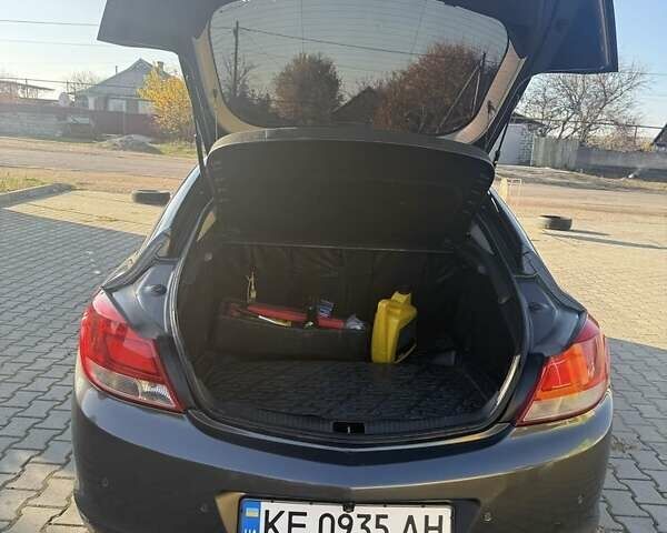 Серый Опель Инсигния, объемом двигателя 2 л и пробегом 263 тыс. км за 7300 $, фото 4 на Automoto.ua