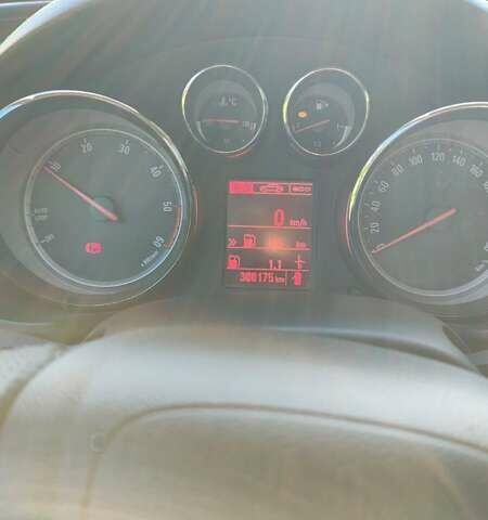 Сірий Опель Інсігнія, об'ємом двигуна 1.96 л та пробігом 300 тис. км за 7500 $, фото 4 на Automoto.ua