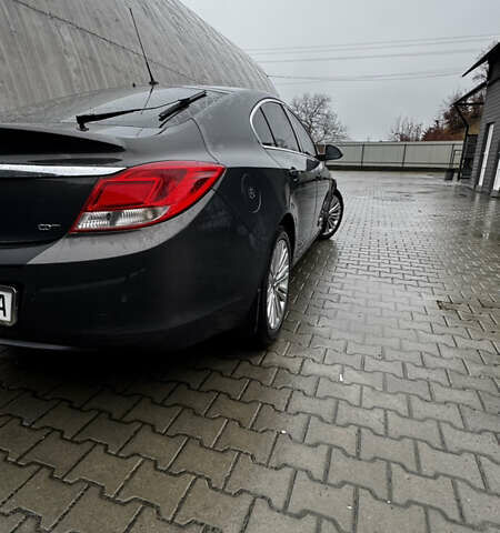 Серый Опель Инсигния, объемом двигателя 1.96 л и пробегом 240 тыс. км за 10500 $, фото 3 на Automoto.ua