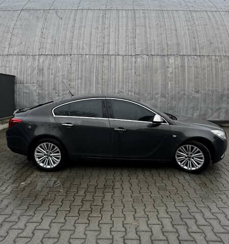 Серый Опель Инсигния, объемом двигателя 1.96 л и пробегом 240 тыс. км за 10500 $, фото 2 на Automoto.ua