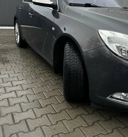 Серый Опель Инсигния, объемом двигателя 1.96 л и пробегом 240 тыс. км за 10500 $, фото 1 на Automoto.ua