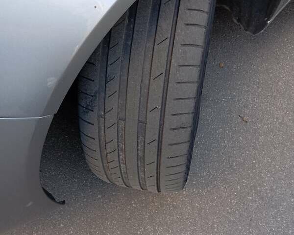 Серый Опель Инсигния, объемом двигателя 2 л и пробегом 234 тыс. км за 10000 $, фото 13 на Automoto.ua