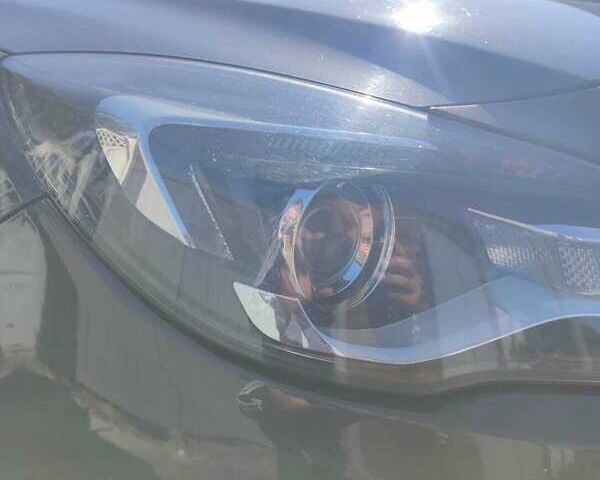 Серый Опель Инсигния, объемом двигателя 2 л и пробегом 256 тыс. км за 13000 $, фото 5 на Automoto.ua