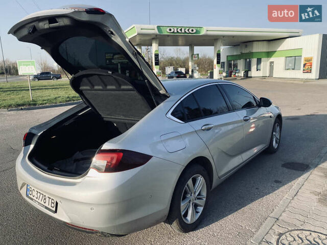 Серый Опель Инсигния, объемом двигателя 1.6 л и пробегом 200 тыс. км за 14400 $, фото 4 на Automoto.ua