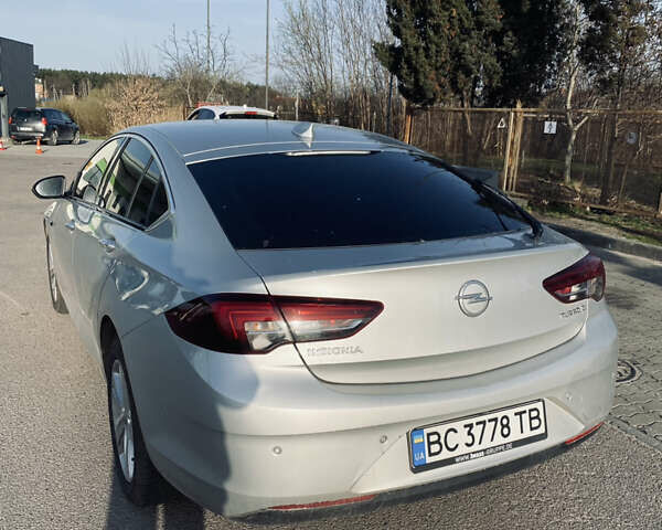 Серый Опель Инсигния, объемом двигателя 1.6 л и пробегом 200 тыс. км за 14400 $, фото 2 на Automoto.ua