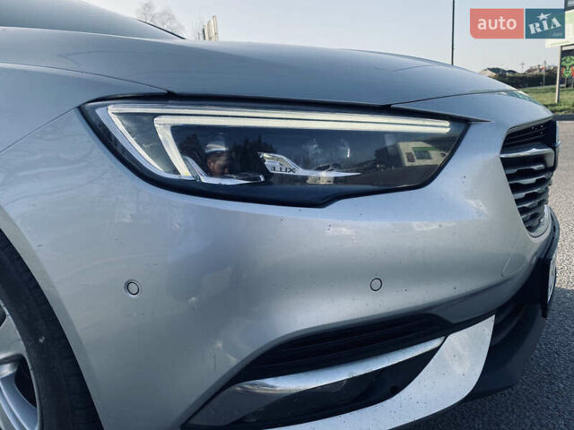 Серый Опель Инсигния, объемом двигателя 1.6 л и пробегом 200 тыс. км за 14400 $, фото 5 на Automoto.ua