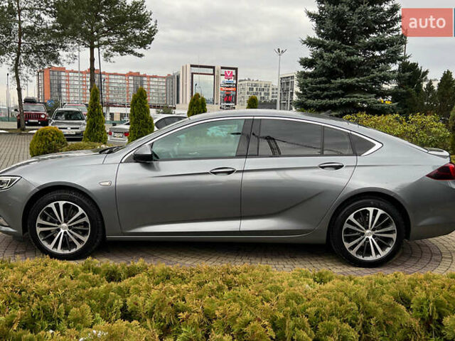 Сірий Опель Інсігнія, об'ємом двигуна 1.96 л та пробігом 113 тис. км за 18700 $, фото 3 на Automoto.ua