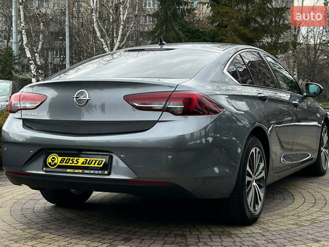 Сірий Опель Інсігнія, об'ємом двигуна 1.96 л та пробігом 113 тис. км за 18700 $, фото 6 на Automoto.ua